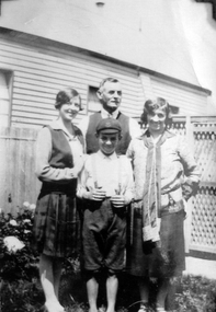 A man, woman, girl and boy