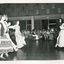 A number of people dancing