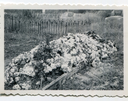 A flower covered grave