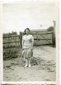 Photograph - Black and White Photograph, Bess Gervasoni in the yard at Roberts Grocery Shop, c1935