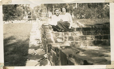 Two women on stone  steps