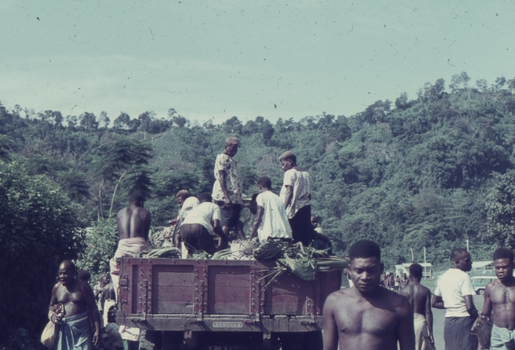 Papuans transporting produce, Papua New Guinea