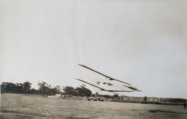 Photograph, Biplane in a paddock