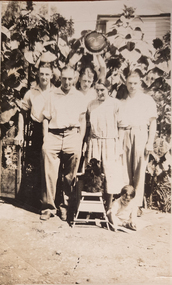 Photograph, A family with Sunflowers