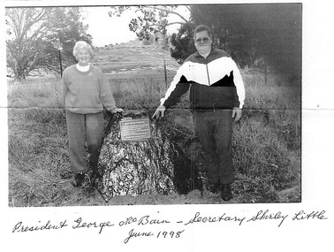 Photograph, George McBain & Shirley Little with Child Plaque