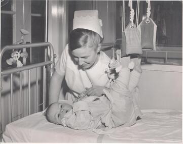 Photograph - School 71 - Nurse caring for child