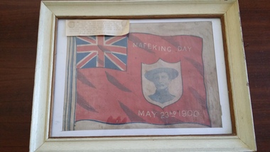 Framed Poster:, "Mafaking Day May 23rd 1900" red ensign with Baden Powell