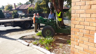Photograph:, Guns being moved from the front of club rooms