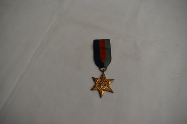 Medal - The 1939 / 45 Star. And ribbon