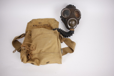 Equipment - Gas mask kit complete with mask, canister, flotation bladder and khaki canvas carry bag