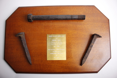 Souvenir - Burma Rail Bridge Bolt & Railway Spikes.On wooden plaque