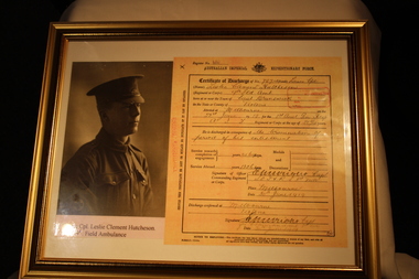 Photograph - Framed photo and discharge certificate, Unknown