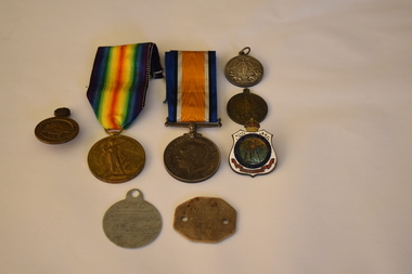 Medal - Service Medals x 2. Dog Tags x 2. Peace 1919 Medals x 2. Return from Active Service Badge x 1. Returned Sailors & Soldiers Imperial League Badge x 1