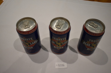 Three blue beer cans depicting the three arms of the Australian Defence Force