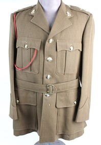 Uniform - 00010.1 - Khaki jacket with  lieutenant colonel R on epaulet,  ordinance corps with red lanyard and khaki material belt. 00010.2 - Khaki trousers, Circa 1970