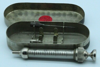 Equipment - Syringe in metal container, Circa 1940s