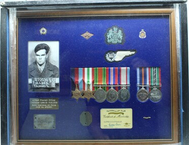 Medal - Fielder, Thomas L, Caterpiller club member and POW  RAAF Air gunner, WW2 onwards