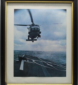 Photograph - Helicpoter trying to land in rough sea