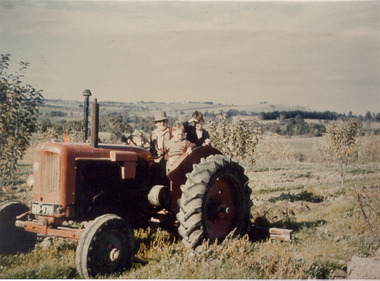 Photograph - Bill, Greg, Ray and Rosalie aboard a tractor at Narre Warren North