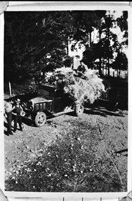 Photograph - Photo of hay stacked on a truck