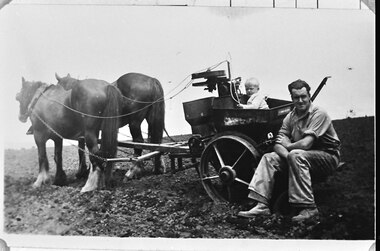 Photograph, Photo - Bill Hermon with his son John, sitting on a horse drawn potato planter