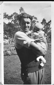 Photograph - Photo - Bill Hermon with his first daughter, Joy, in the 1940s