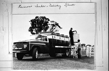 Photograph - Hermon's tanker and delivery driver filling a farm fuel tank