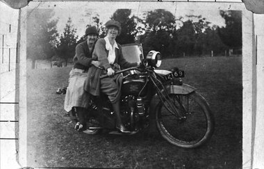 Photograph - Two women on a motorcycle
