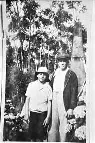 Photograph - Bill Slingo Senior and Junior by tin chimney, 1937