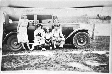 Photograph - Alice Slingo, Ann Lord, Bill Slingo Senior and Junior, posed with a Graham Paige car at Lysterfield lake