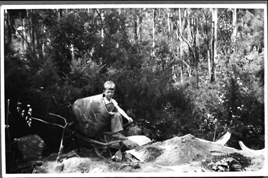 Photograph - Terry Smith at the building site of the caretaker's house, Belgrave Reservoir, c.1940s