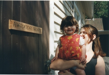 Photograph - Rowan and Rhiannon Matta, out the front of the Southern Sherbrooke Historical Society's building, 1997