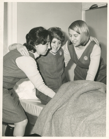 Royal District Nursing Service (RDNS) Sisters demonstrating a lifting technique