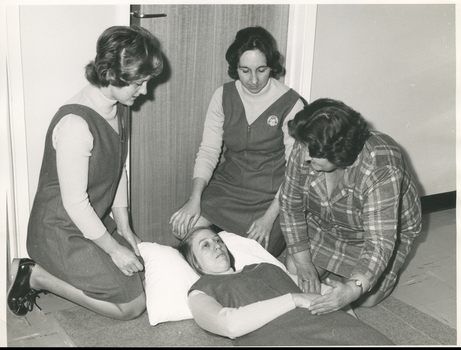 Royal District Nursing Service (RDNS) Sisters receiving instruction from a Physiotherapist