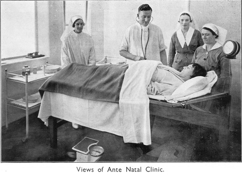 A Doctor, Sisters and patient in the Ante Natal Clinic at the Melbourne District Nursing Society After-Care Home.