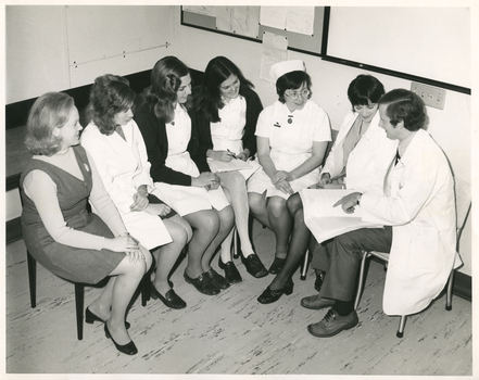 A Royal District Nursing Service (RDNS) Liaison Officer at a Hospital meeting