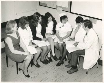 A Royal District Nursing Service (RDNS) Liaison Officer at a Hospital meeting