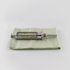 Auric syringe