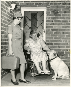 A Royal District Nursing Service (RDNS) Sister visiting a patient at her home.