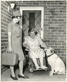 A Royal District Nursing Service (RDNS) Sister visiting a patient at her home.