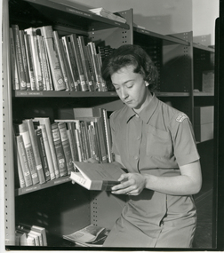 A Royal District Nursing Service (RDNS) Sister in the RDNS Library