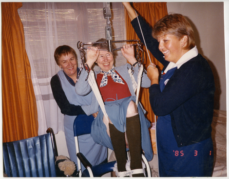 Royal District Nursing Service (RDNS) Sisters transferring a patient by hoist