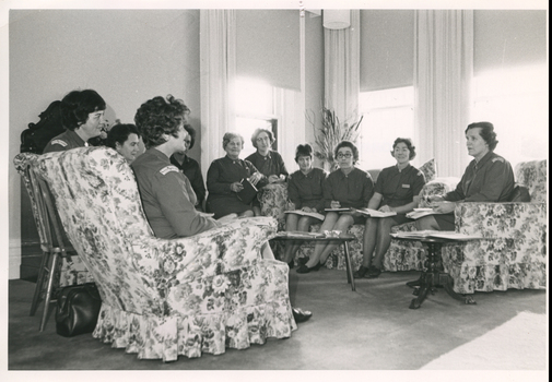 Miss Evans, DON of Royal District Nursing Service (RDNS) holding a meeting with staff