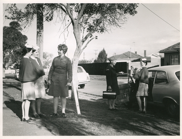 Royal District Nursing Service (RDNS) Sisters outside RDNS Footscray Centre with Footscray Hospital nursing students