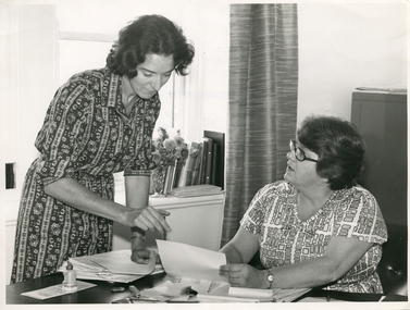 The Royal District Nursing Service (RDNS) Medical Records Librarian in discussion with the Social Worker