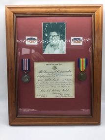 Framed medals, Colin & Shirley Leviston