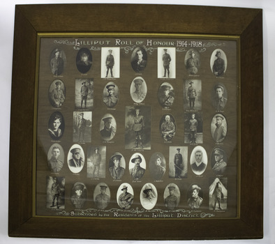 Tan coloured wooden glass-fronted frame with handpainted card mount of collage of soliders sepia or black and white photograph portraits with each soldier's name painted underneath each portrait.