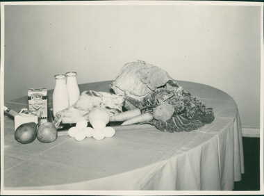 Photograph, Promotional display of food, including fruit & vegetables, on a table representing healthy eating - Taken by the Public Health Department - Publicity Photographs