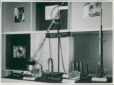 Photograph, "Analysis for sulphur dioxide in meat" promotional display of analytical equipment of the day - Department of Health - Publicity material
