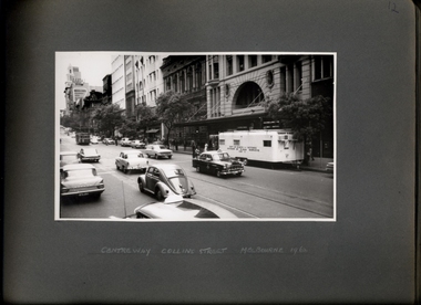 Photograph, A view of the chest x-ray caravan operating outside of Centreway Arcade Collin Street in 1962, looking towards the Melbourne City Town Hall, and further St Patricks - 3 of 3 Photos - Department of Health - Tuberculosis Branch - Publicity material
